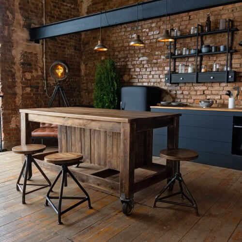 arredare casa stile industriale cucina e tavolo sgabelli