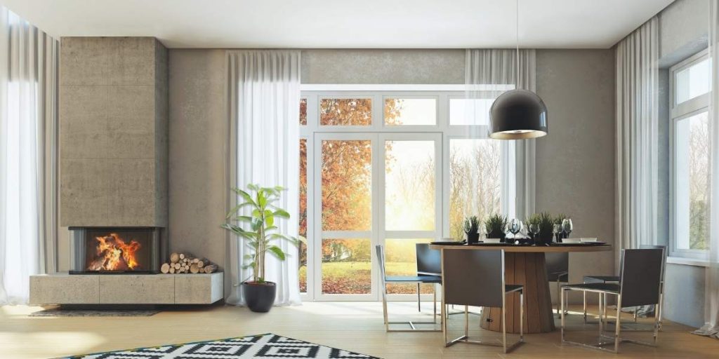Come scegliere il camino perfetto per il tuo appartamento: i consigli dell’Arch. Vanin | Facile Ristrutturare Camino a legna aperto e chiuso con pellet. Salone con camino.