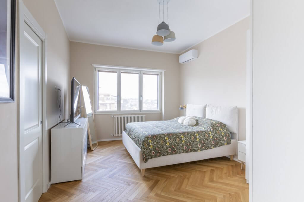 zona notte con parquet a spina di pesce